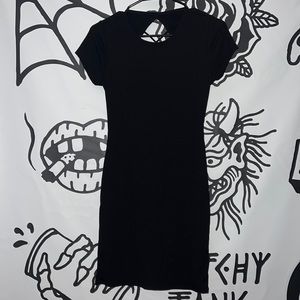 Black fitted dress with open back crisscross straps